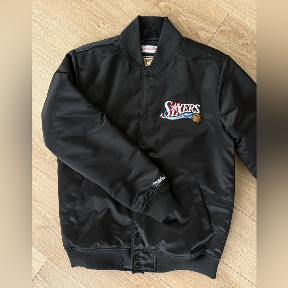 Mitchell & Ness 76ers Black Satin Bomber Jacket with Embroidered Logo